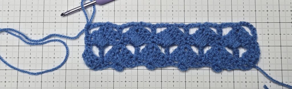 The overlapping shell stitch row 4