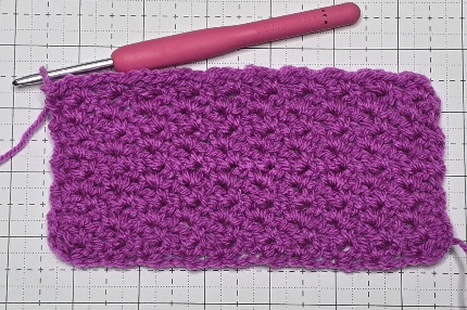 The wattle stitch tension square being made